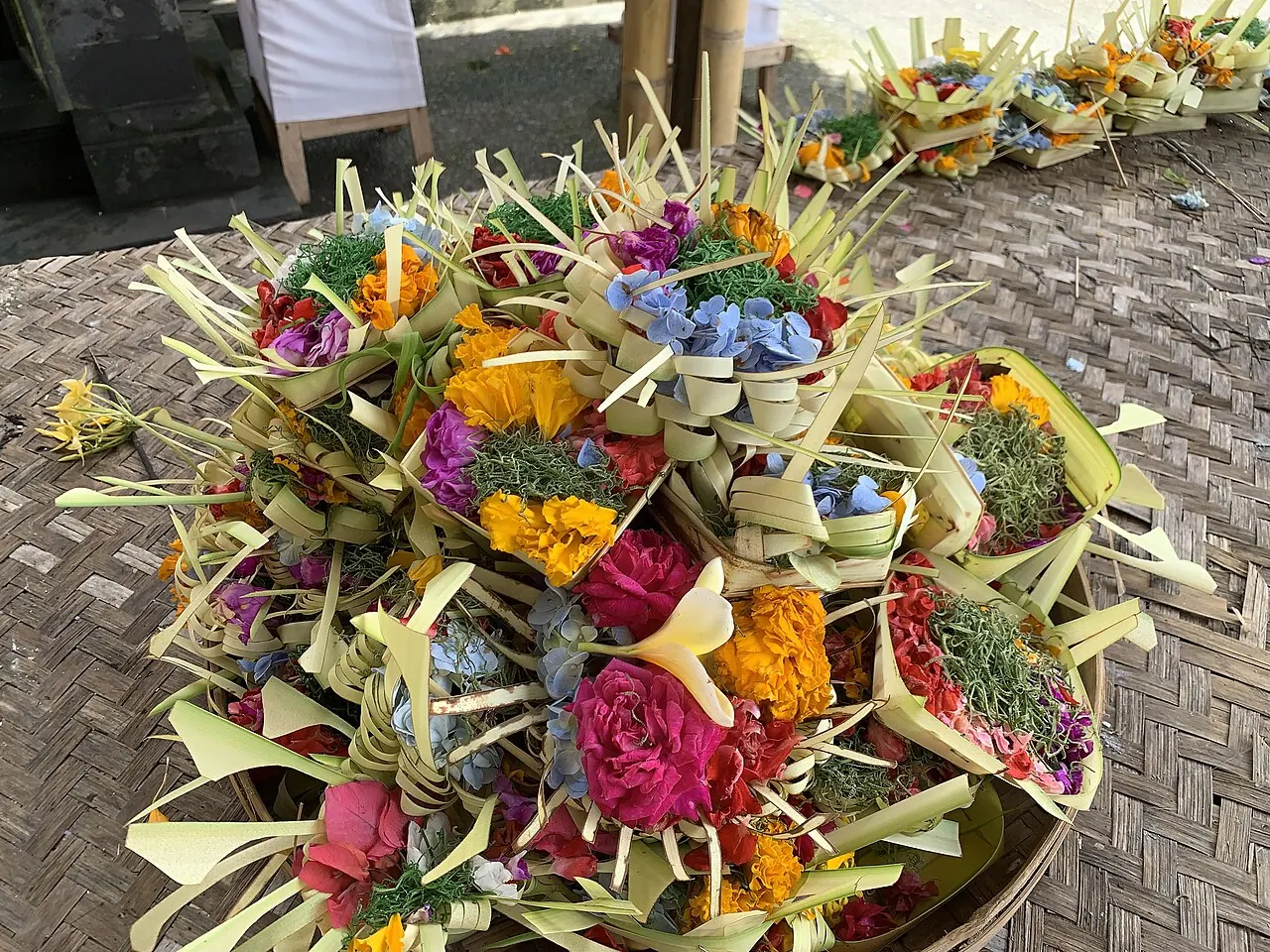 Canang sari. The small daily offering left at shrines, doorways and dashboards.